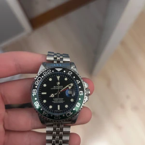 Klocka  - Skriv vad ni vill betala 