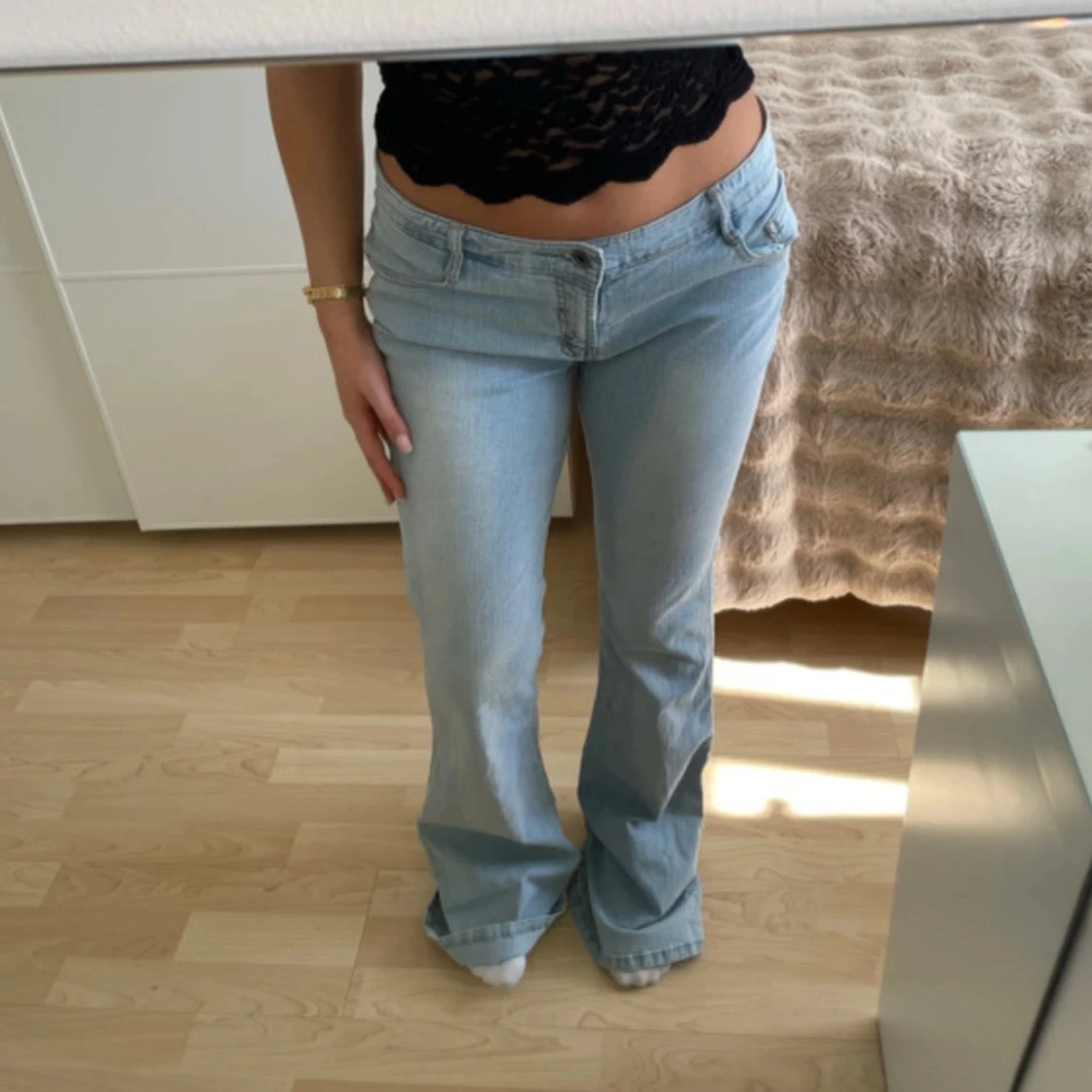 Ljusblå bootcut jeans