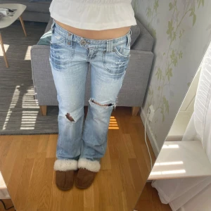 Jeans lowwaist utsvängda lågmidjade bootcut håliga hål - Jeans med hål!
