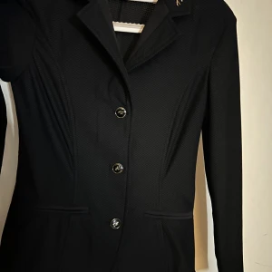 Tävlingskavaj - Helt ny kavaj som aldrig hann komma till användning 