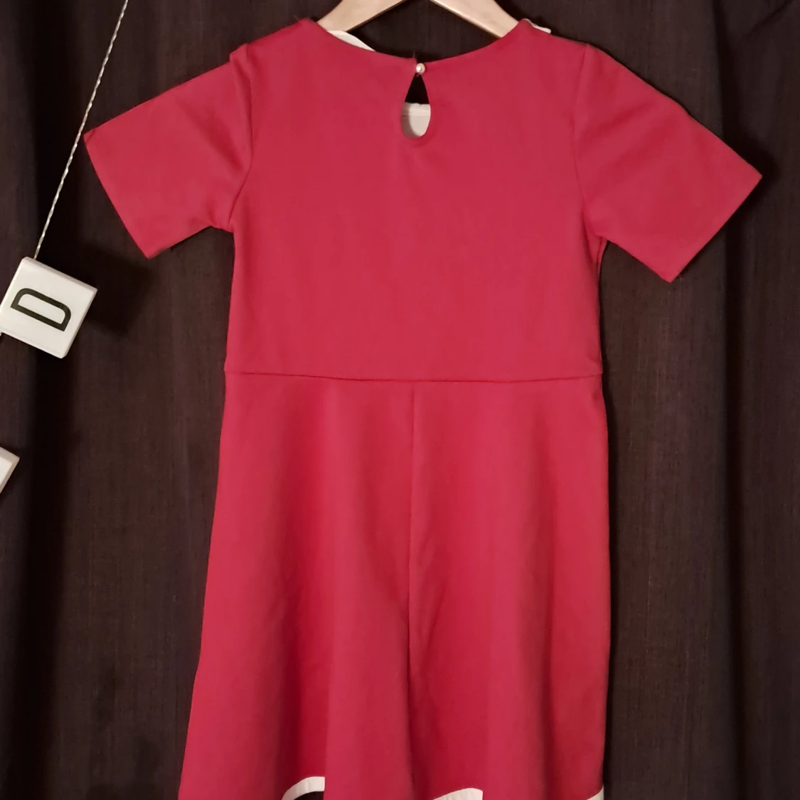 Röd kortklänning med rosett från H&M (barn) - 1