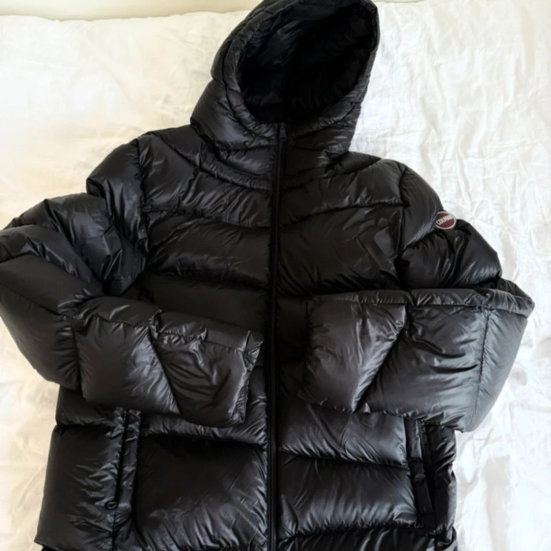 Svart dunjacka från Colmar