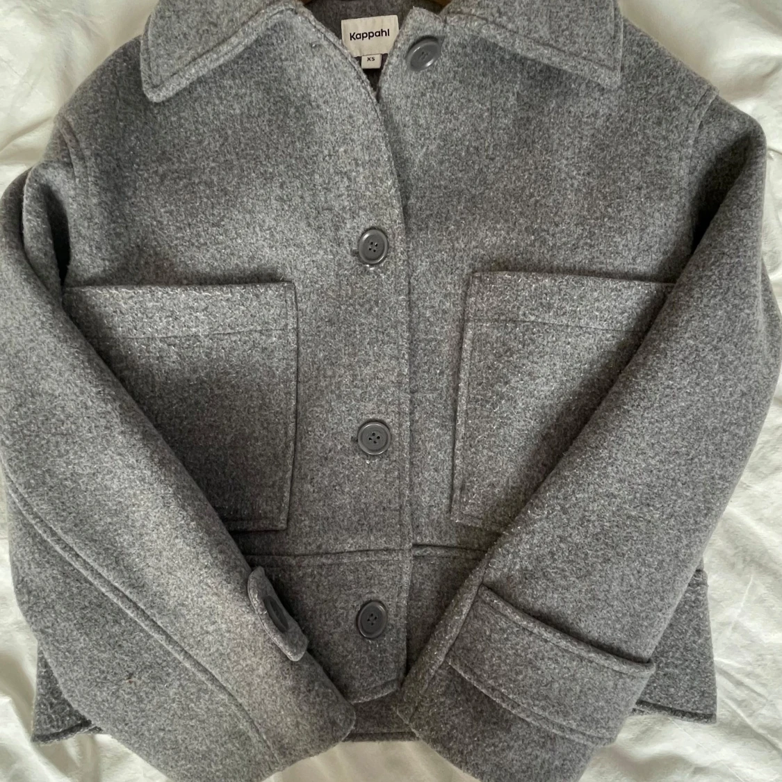Grå ullrock från Kappahl XS