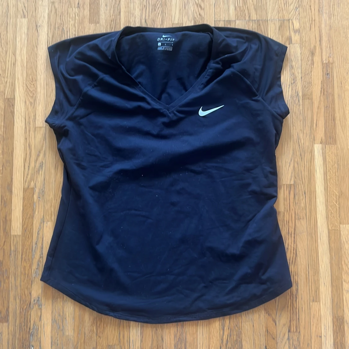 Svart Dri-FIT topp från Nike