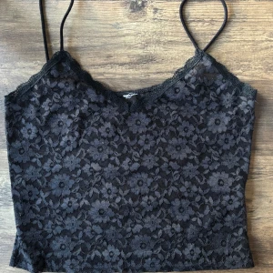 spetstopp - superfin spetstopp med blommigt mönster 