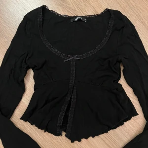 Svart topp - Använd 1 gång.