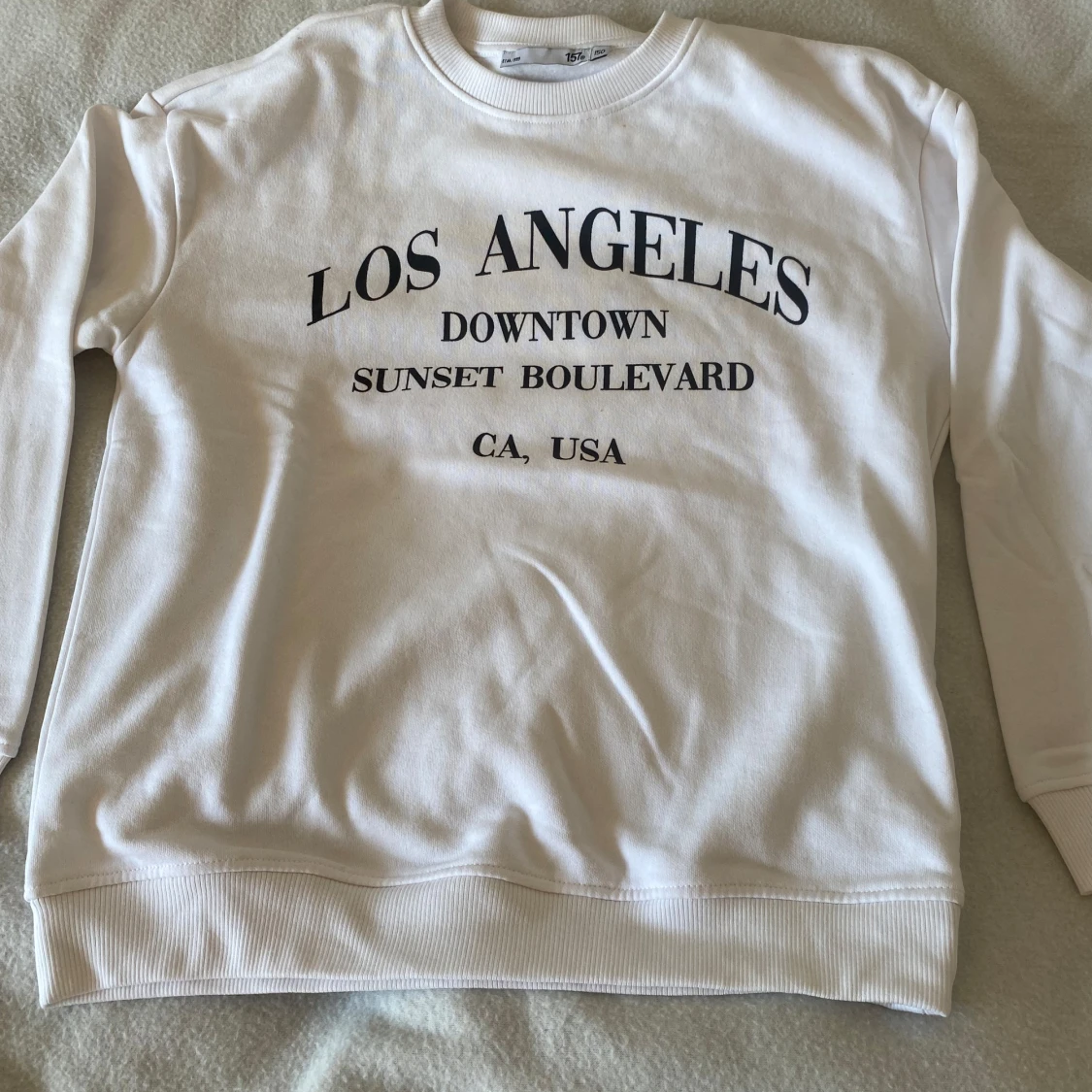 Vit sweatshirt med Los Angeles-tryck
