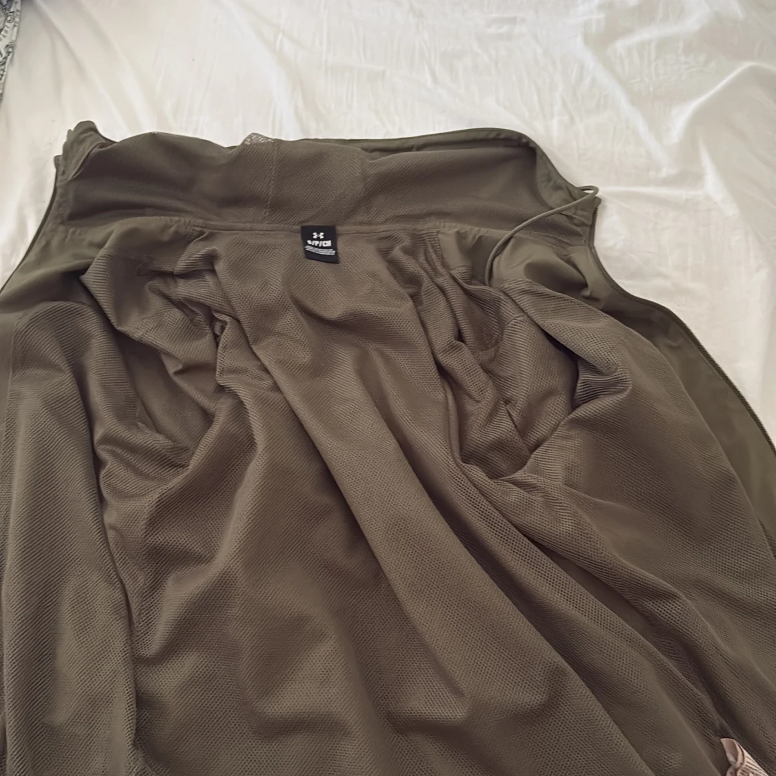 Olivgrön vindjacka från Under Armour - 1