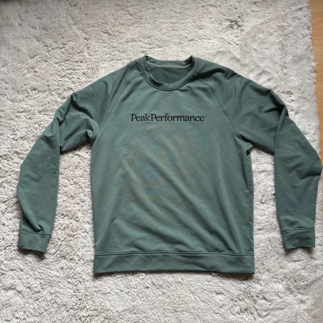 Grön Peak Performance sweatshirt