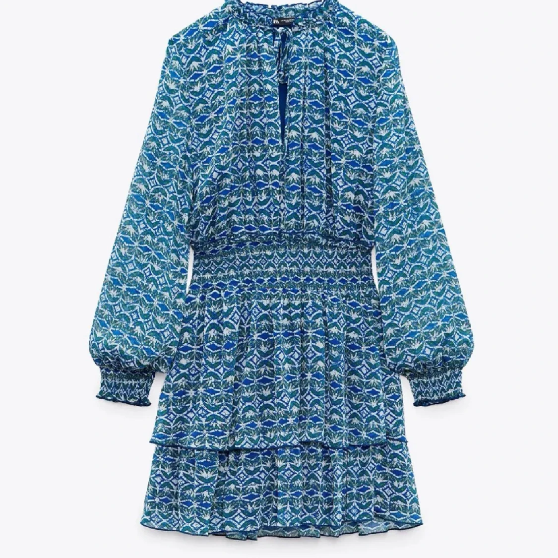 Blå mönstrad klänning från Zara