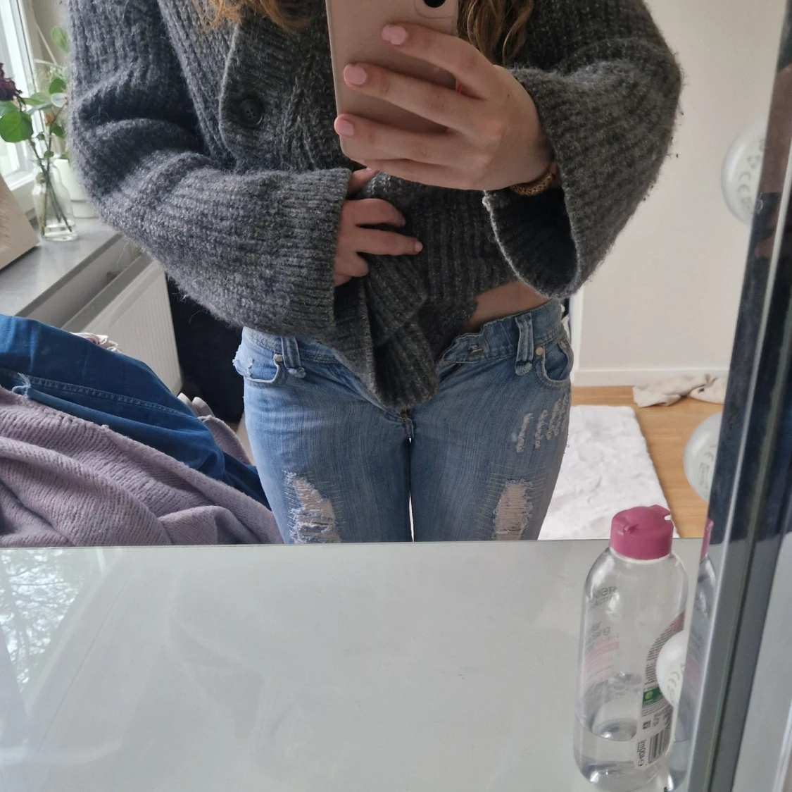 Ljusblå slitna bootcut jeans - 2