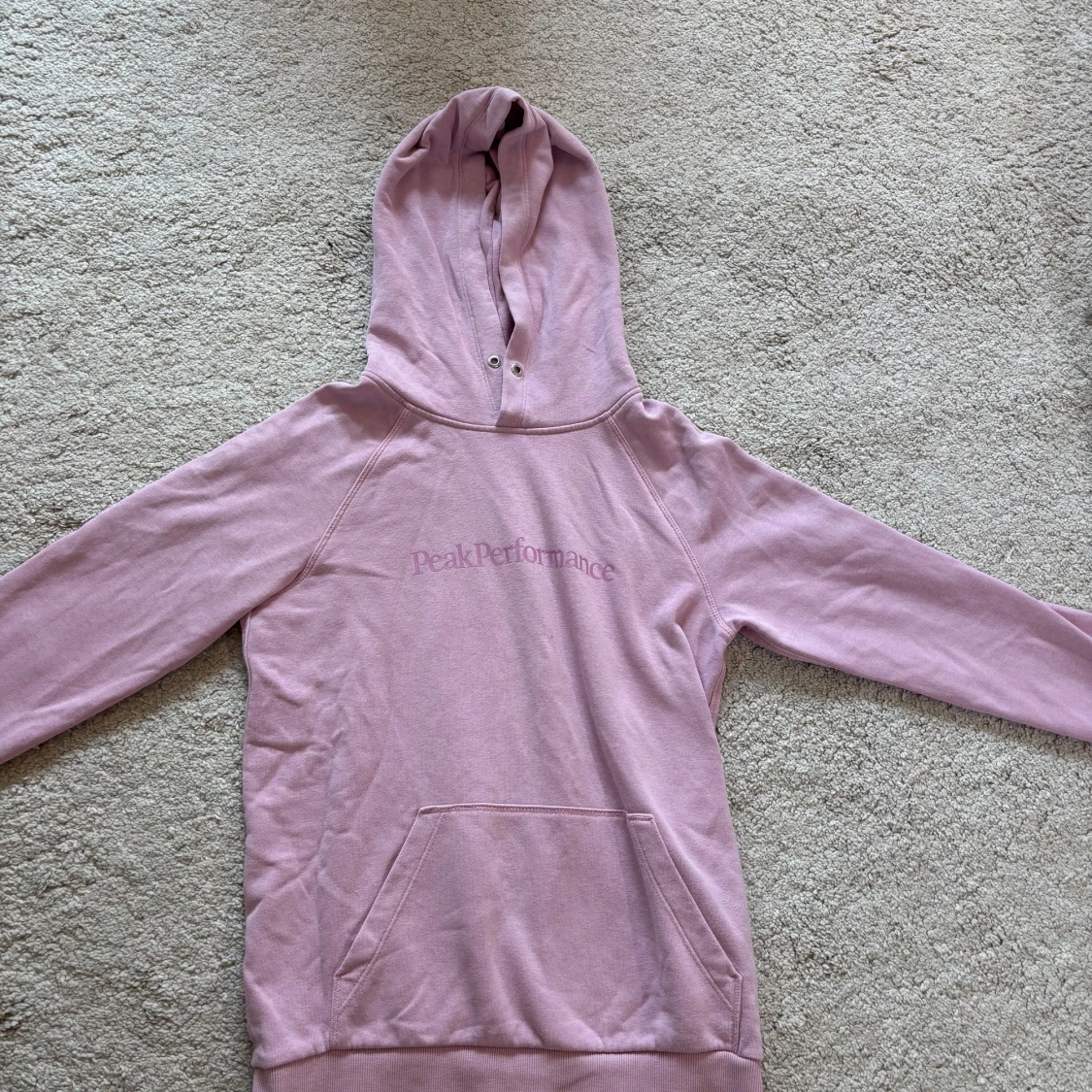 Ljusrosa hoodie Peak Performance S