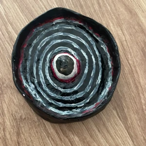 Clay jewelry trinket - Alternative hand-made clay jewelry trinket with eyeball, spiraling out from the middle. 