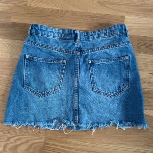 Jeanskjol - Snygg blå jeanskjol