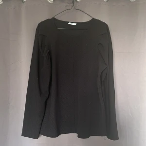 Svart Långärmad  - Aldrig använd, köpt för 299kr