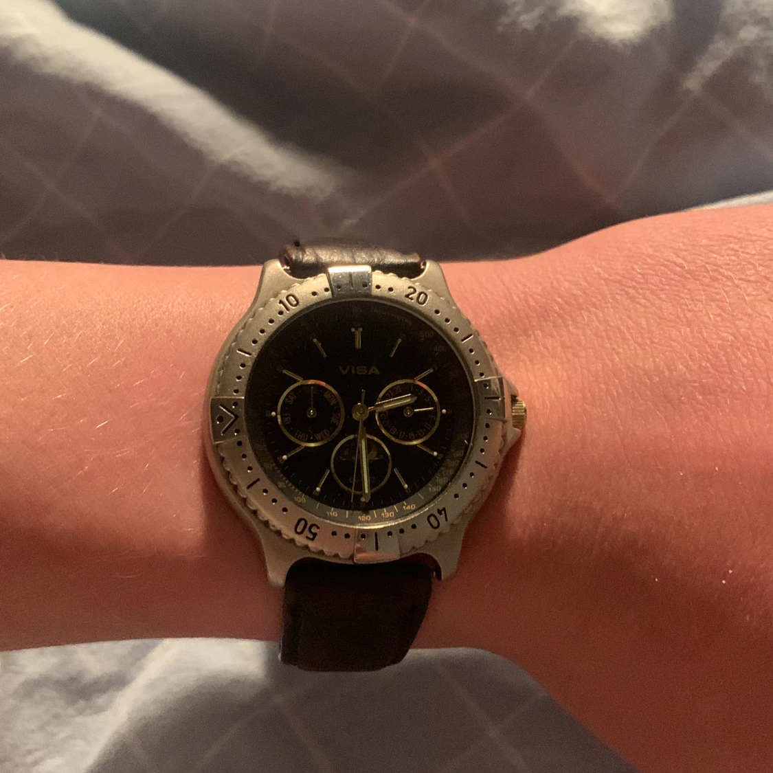 Klocka från Visa med brunt läderarmband