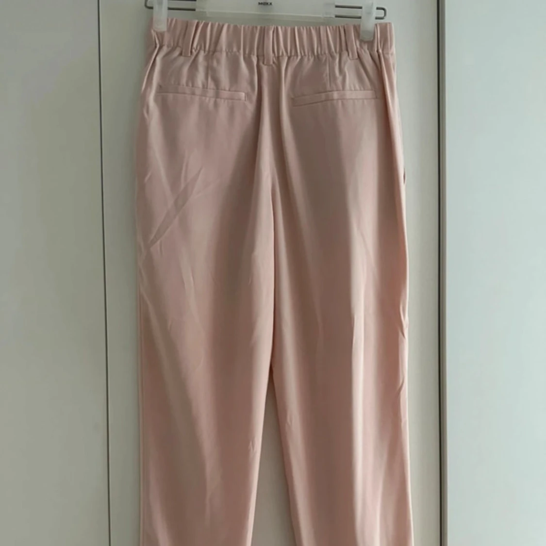 Ljusrosa byxor - 1