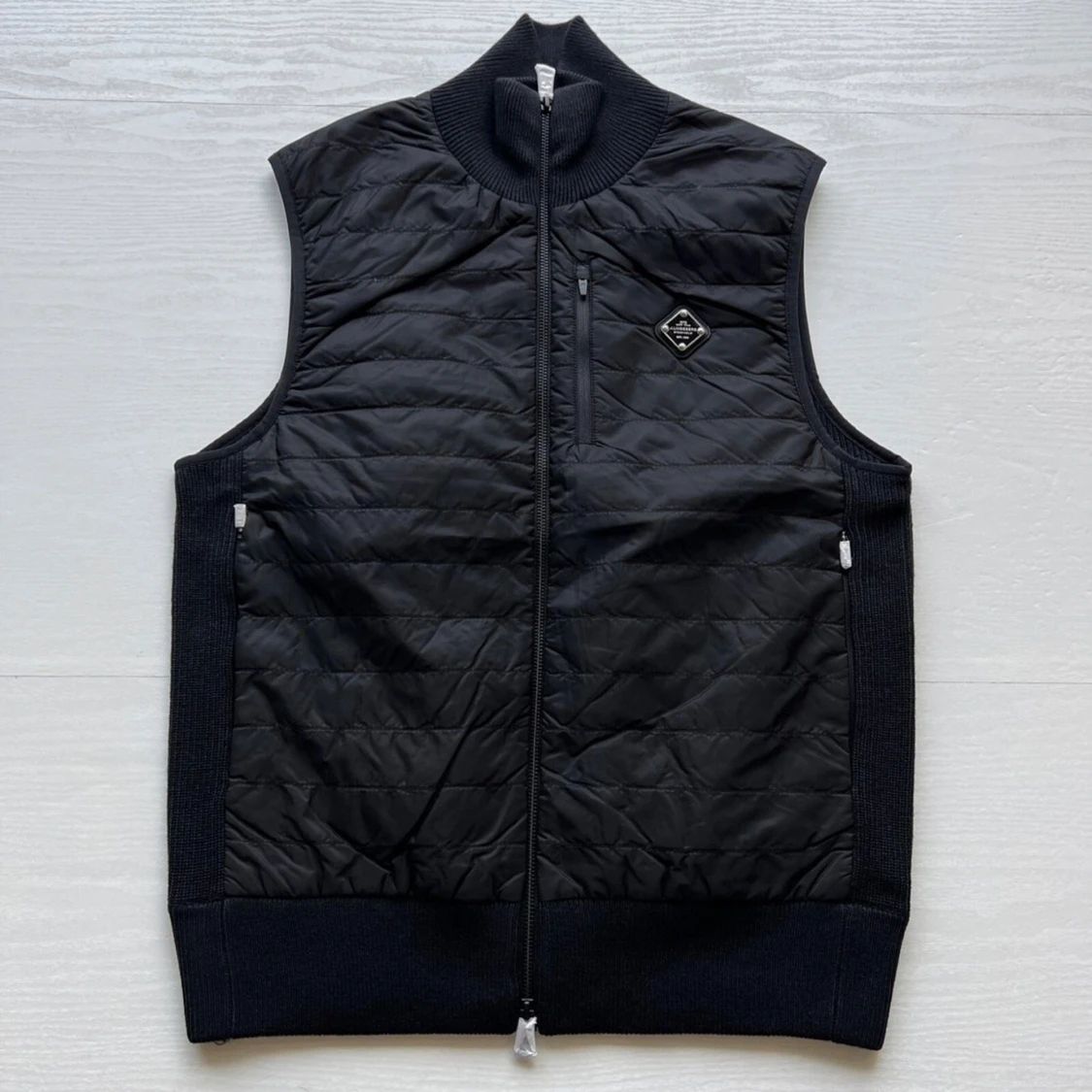 Svart quiltad väst från J.Lindeberg