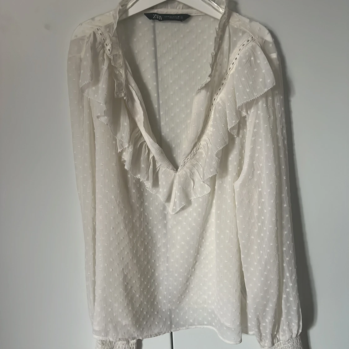 JĂ€tte fin vit blusđ€