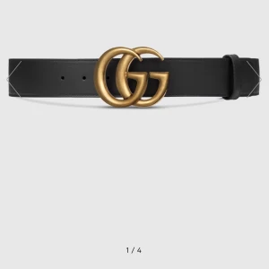 Svart skärp med guldspänne - Snyggt svart skärp från Gucci med ett stort, ikoniskt GG-spänne i guld. Perfekt för att ge en lyxig touch till din outfit. Skärpet är tillverkat i skinn och har en klassisk design som aldrig går ur stil.orginal så klart!ordinarie pris ca 4200