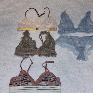 Fyra spetsiga braletter i olika färger  stS - Säljer fyra olika braletter i spets. En vit med gul detalj, en ljusblå, en brun och en randig i rosa och beige. Alla har spetsdetaljer och justerbara axelband. Perfekta för en bekväm och stilren look.