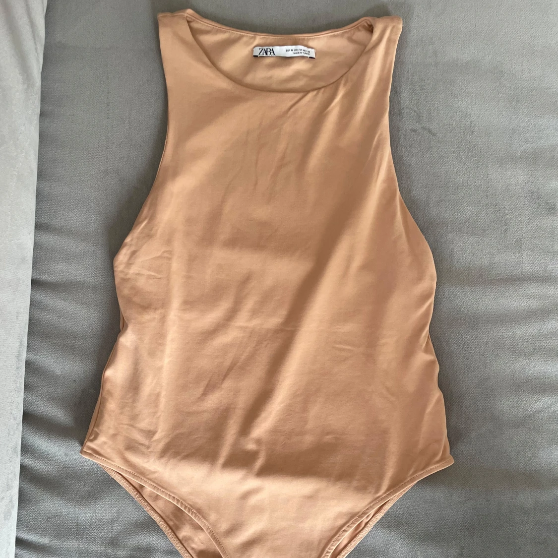 Beige ärmlös body från Zara