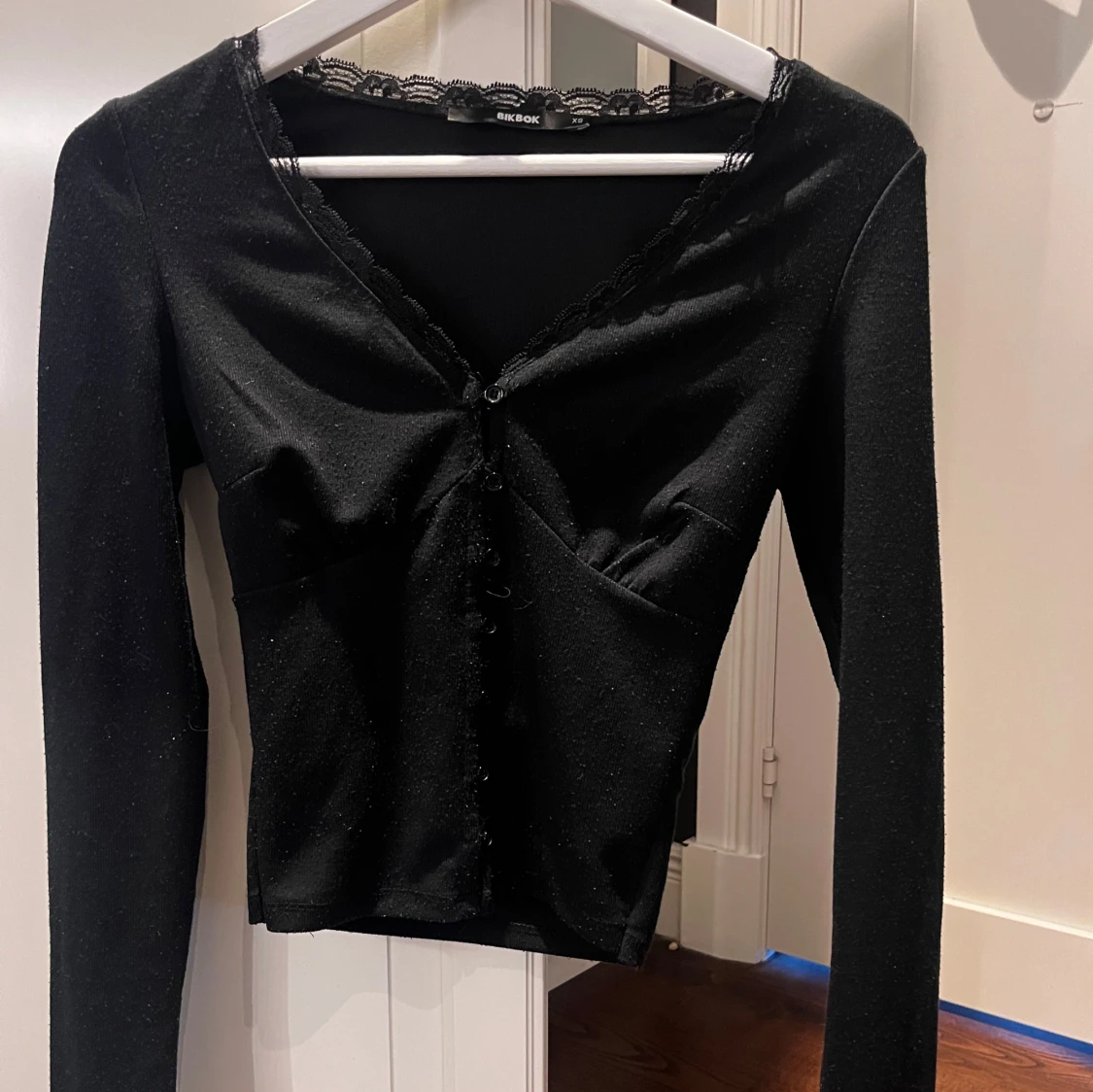 Svart långärmad topp med spets från BikBok