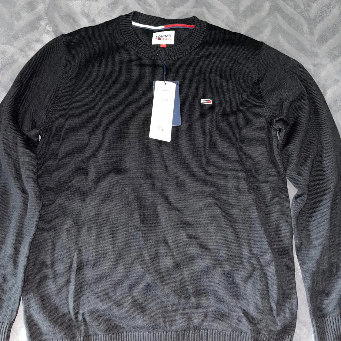 Svart stickad tröja från Tommy Jeans