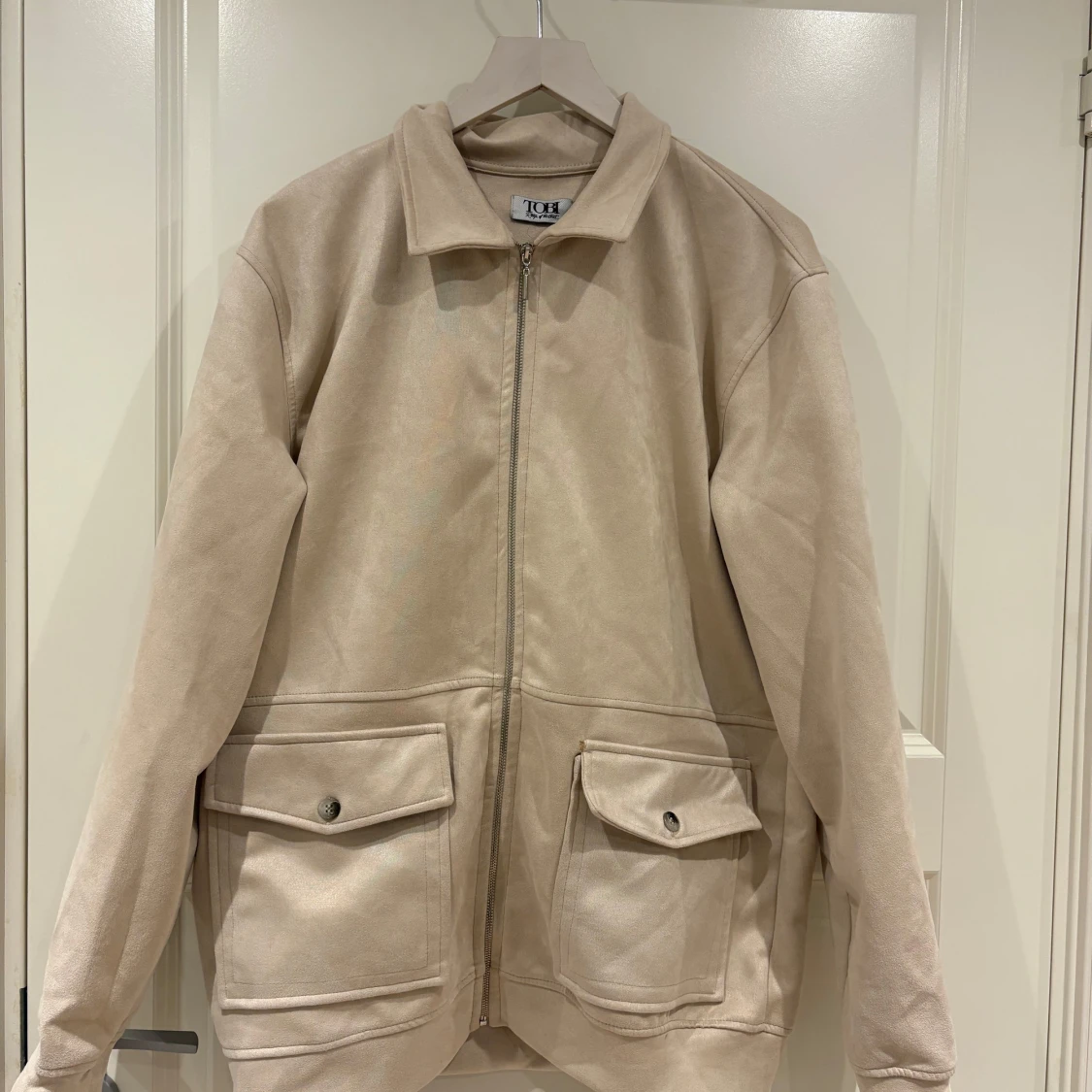 Beige mockajacka från TOH