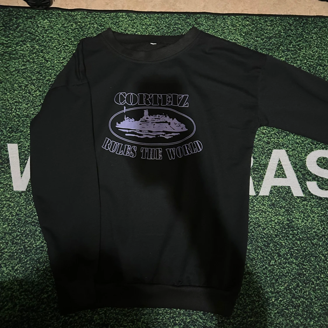 Svart Corteiz sweatshirt med tryck