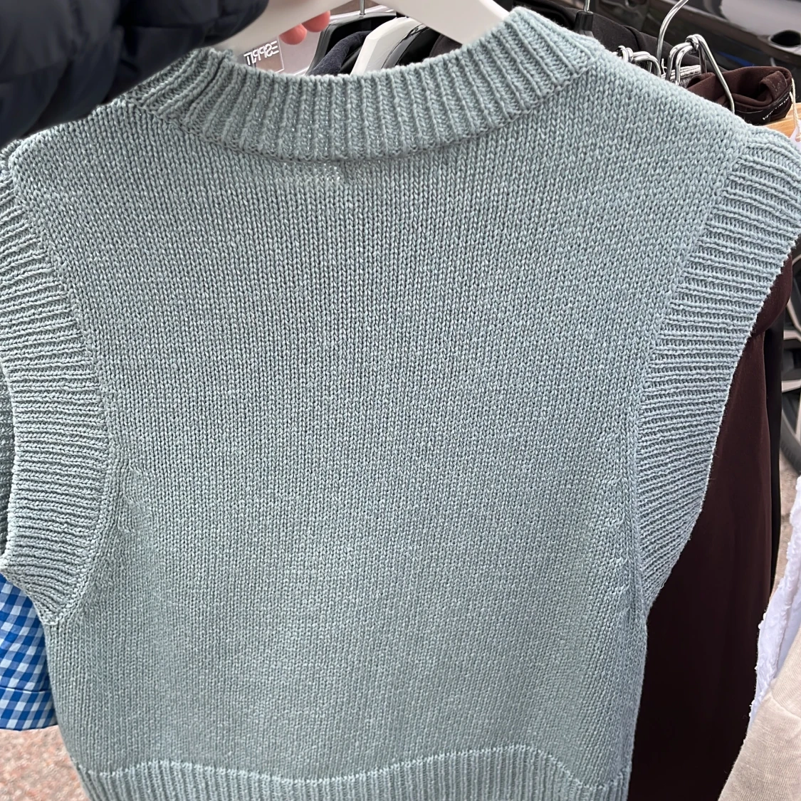 Turkos stickad väst - 1