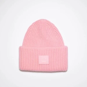 Acne mössa - Säljer denna superfina rosa Acne mössa pga använder den inte längre. Inte använd så mycket och därav superfint skick. Finns inga tecken på användning så den är som ny. Nypris är 1500.