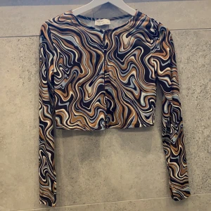 Långärmad topp - Mönstrig topp