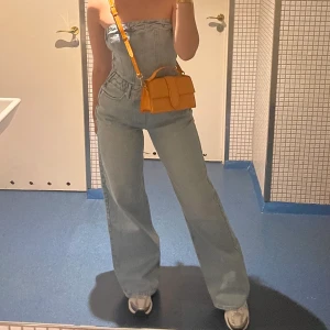 Jeans jumpsuit  - Använd en gång. St.M 