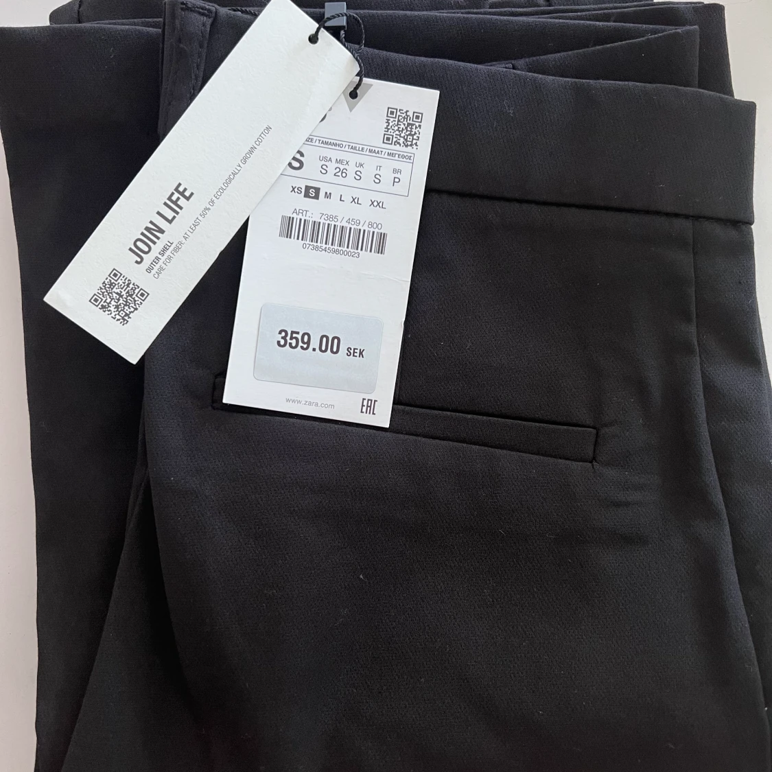 Utsvängda kostymbyxor  - 91