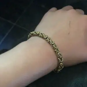 Fint armband doppad i guld