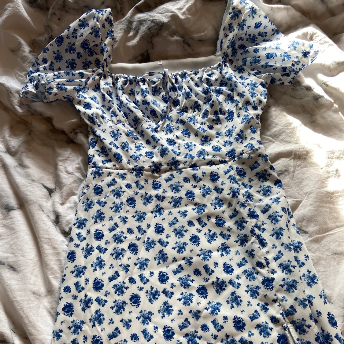 Blommig klänning - 91