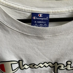 Äkta Champion T-Shirt - En äkta, mycket oanvänd champion tröja. Som ny. Ny pris- 400kr