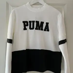 En oanvänd sweatshirt från Puma, lappen är kvar 
