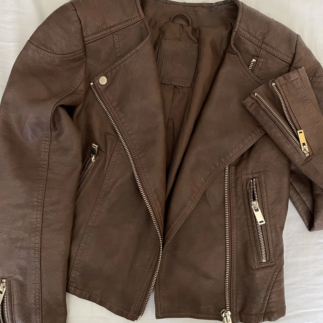 Brun skinnjacka  - 90