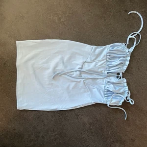 Ljusblå korsettklänning M - Strl M/38 Oanvänd 