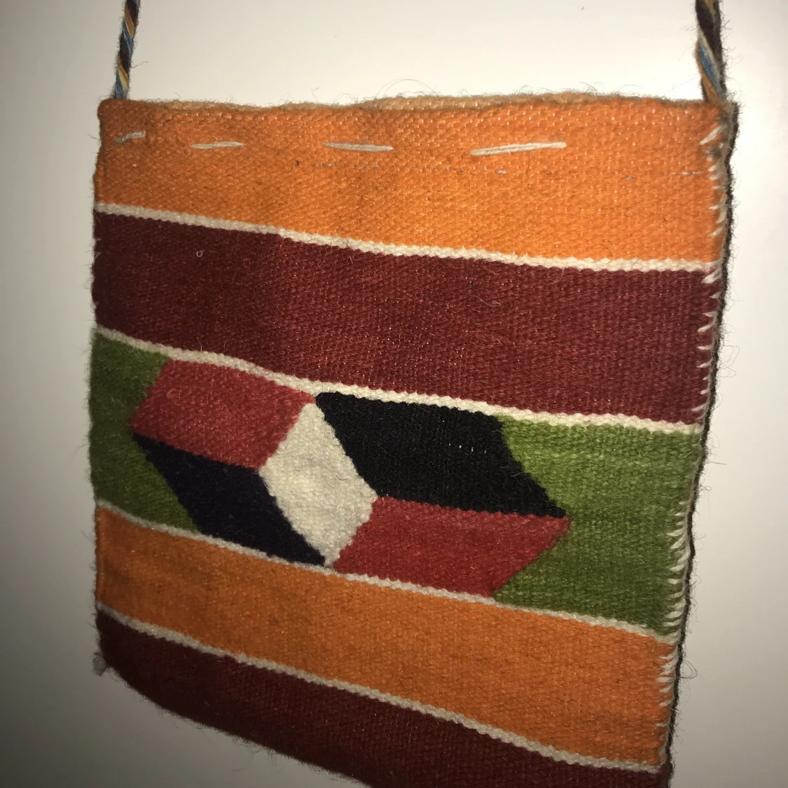 flerfärgad tygväska