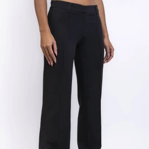 Low waist kostymbyxor - Säljer mina nya kostymbyxor eftersom de är för stora för mig. I nyskick. 