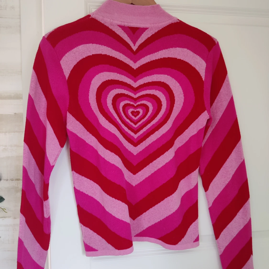 Rosa hjärtmönstrad stickad tröja - 90