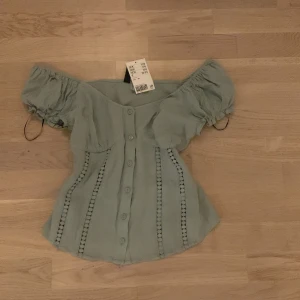 Hm topp - Helt oandvänd och ny. Passade inte min stil