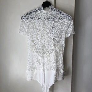 Body från Nelly • strl M - Body från Nelly i storlek M. Aldrig använd. 