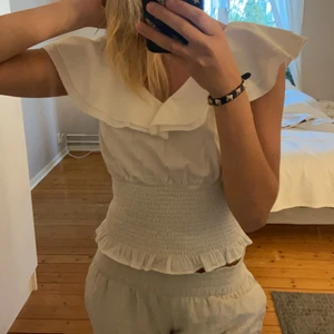 Topp - En topp i storlek S