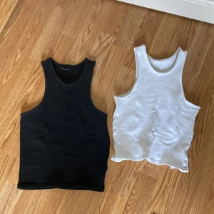 Två linnen - Säljer dessa två linnen ifrån Gina Tricot då jag inte andvänder dom längre! Ett svart och ett vitt.