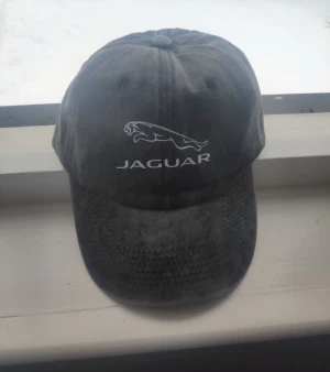 Jaguar keps - Keps i i grå vintage tvätt. Helt ny. Justerbar