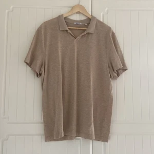 Beige piké - Beige piké storlek XL passar M/L